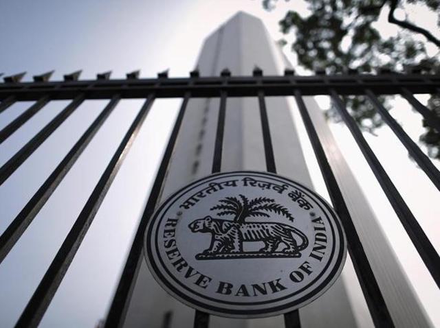 The Reserve Bank of India (RBI) seal is pictured on a gate outside the RBI headquarters. Indian banks are grappling with more than 110 billion dollars of corporate stressed debt, a burden that is holding back fresh loans and hampering a speedier economic recovery. (Reuters file photo) The Reserve Bank of India (RBI) seal is pictured on a gate outside the RBI headquarters. Indian banks are grappling with more than 110 billion dollars of corporate stressed debt, a burden that is holding back fresh loans and hampering a speedier economic recovery. (Reuters file photo)