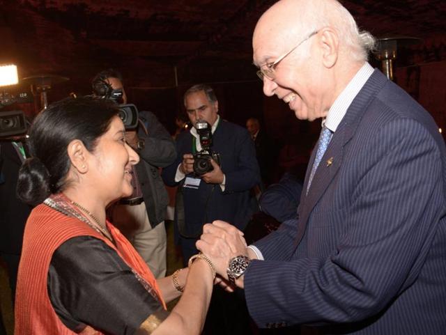 Pakistan Prime Minister’s adviser on foreign affairs Sartaj Aziz (R) greets external affairs minister Sushma Swaraj in Islamabad. Swaraj arrived in Pakistan to attend the two-day ‘Heart of Asia’ conference, the highest-level visit from Delhi in years. (AFP Photo) Pakistan Prime Minister’s adviser on foreign affairs Sartaj Aziz (R) greets external affairs minister Sushma Swaraj in Islamabad. Swaraj arrived in Pakistan to attend the two-day ‘Heart of Asia’ conference, the highest-level visit from Delhi in years. (AFP Photo)