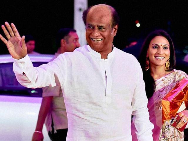 Rajinikanth was criticised for contributing a meagre Rs 10 lakhs for the Chennai flood victims. Seen here, with his elder daughter Aishwarya, at the wedding reception of Shatrughan Sinha’s son Kussh. (AFP) Rajinikanth was criticised for contributing a meagre Rs 10 lakhs for the Chennai flood victims. Seen here, with his elder daughter Aishwarya, at the wedding reception of Shatrughan Sinha’s son Kussh. (AFP)