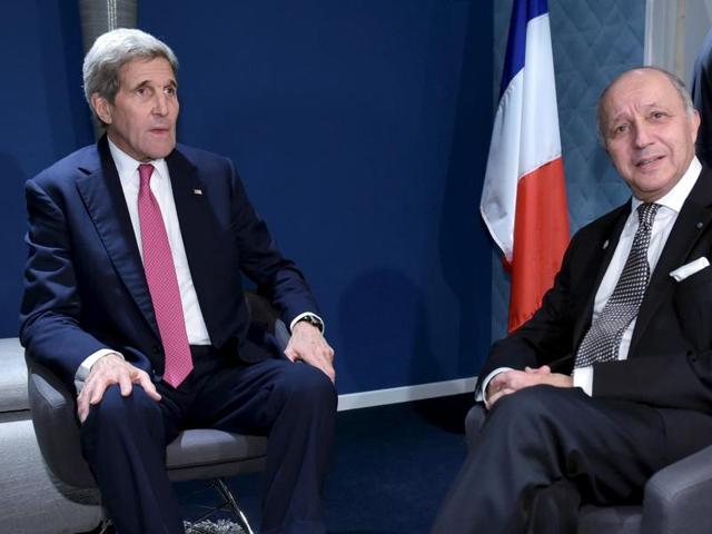 US Secretary of State John Kerry (L) takes part in a bilateral meeting with French Foreign Minister Laurent Fabius on the sideline of the COP 21 United Nations conference on climate change. Rich nations led by the US and the EU have forged an alliance with the least-developed nations that could potentially isolate India and China. (REUTERS Photo) US Secretary of State John Kerry (L) takes part in a bilateral meeting with French Foreign Minister Laurent Fabius on the sideline of the COP 21 United Nations conference on climate change. Rich nations led by the US and the EU have forged an alliance with the least-developed nations that could potentially isolate India and China. (REUTERS Photo)