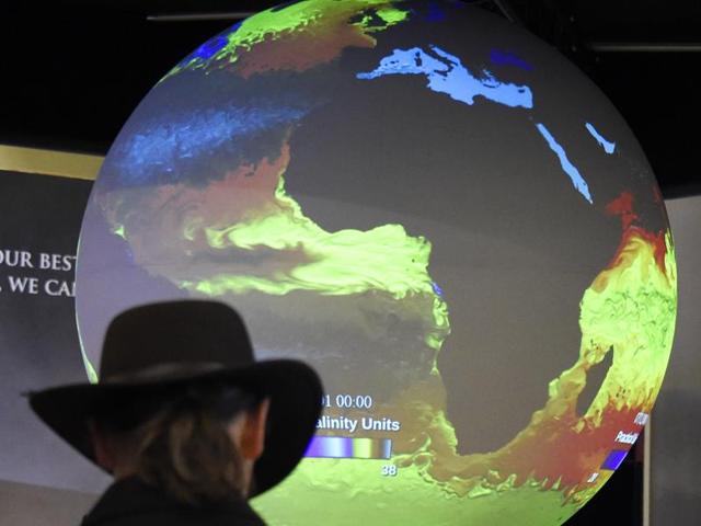 A man visits the US pavillon at the climate change conference in Le Bourget, north of Paris. (AFP photo) A man visits the US pavillon at the climate change conference in Le Bourget, north of Paris. (AFP photo)