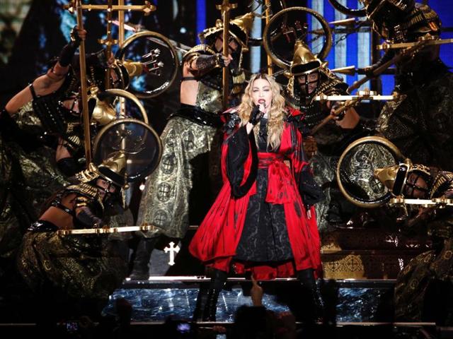 Queen of pop Madonna performs during a lavish Japan-influenced concert in Paris. (AFP) Queen of pop Madonna performs during a lavish Japan-influenced concert in Paris. (AFP)