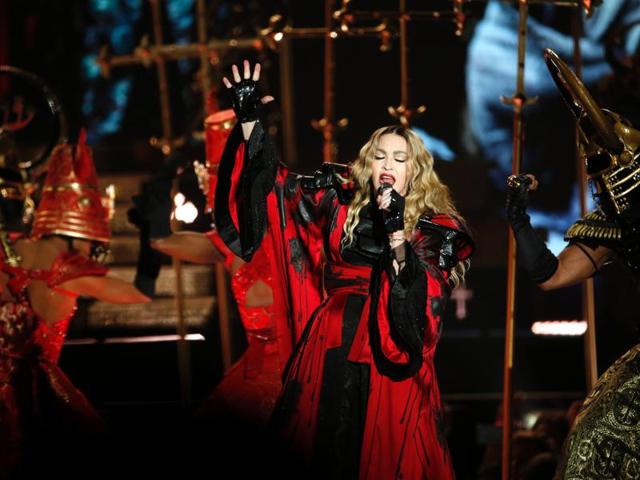 Pop legend Madonna performs delivers a grand performance in Paris. (AFP) Pop legend Madonna performs delivers a grand performance in Paris. (AFP)