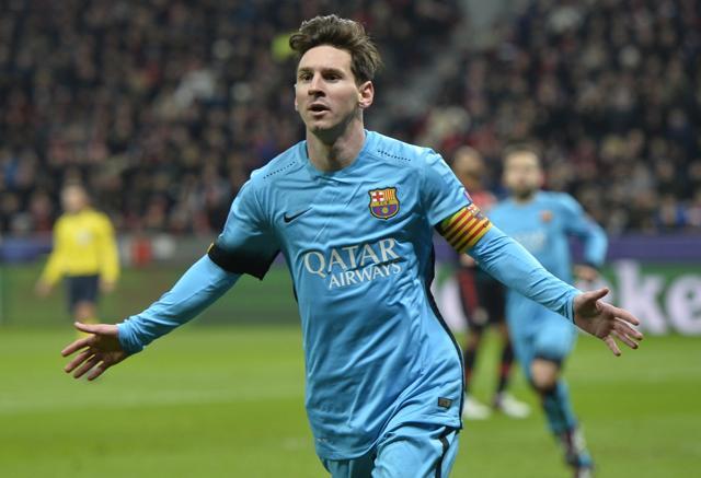 Barcelona's Lionel Messi celebrates after scoring the opening goal during the Champions League Group E soccer match between Bayer Leverkusen and FC Barcelona ion December 9, 2015. (AP Photo)