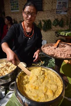 A Naga prepares a dish made from millet. (AFP) A Naga prepares a dish made from millet. (AFP)
