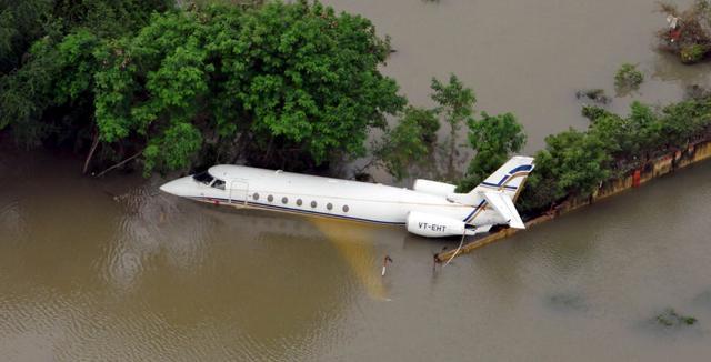 An aerial view of a partially submerged airplane is pictured in a flood affected area in Chennai. (REUTERS) An aerial view of a partially submerged airplane is pictured in a flood affected area in Chennai. (REUTERS)