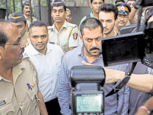 Bollywood star Salman Khan makes his way out of the Bombay high court after he was acquitted of all charges in the 2002 hit and run case, in Mumbai on Thursday.(Arijit Sen/HT Photo)