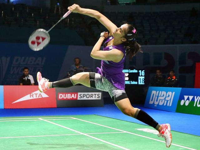 Saina Nehwal of India returns a shot against Carolina Marin of Spain during the women's singles match during the Dubai World Superseries Finals badminton tournament in Dubai on December 10, 2015. (AFP Photo) Saina Nehwal of India returns a shot against Carolina Marin of Spain during the women's singles match during the Dubai World Superseries Finals badminton tournament in Dubai on December 10, 2015. (AFP Photo)