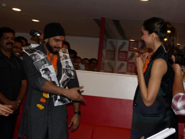 Ladies first? Ranveer offers his seat to Deepika during a promotional event for Bajirao Mastani. (IANS) Ladies first? Ranveer offers his seat to Deepika during a promotional event for Bajirao Mastani. (IANS)