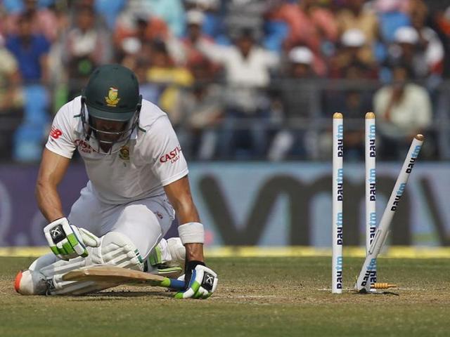 South Africa's Faf du Plessis sits after he was bowled out by India's Amit Mishra during the third day of their third test cricket match in Nagpur on November 27, 2015.(Reuters Photo)