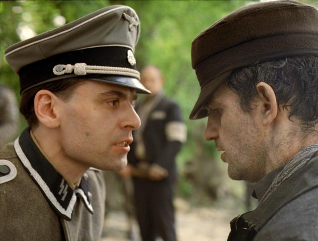 This image released by Sony Pictures Classics shows Christian Harting, left, and Geza Rohrig in a scene from Son of Saul. The film was nominated for a Golden Globe award for best foreign language film on Thursday. (AP) This image released by Sony Pictures Classics shows Christian Harting, left, and Geza Rohrig in a scene from Son of Saul. The film was nominated for a Golden Globe award for best foreign language film on Thursday. (AP)