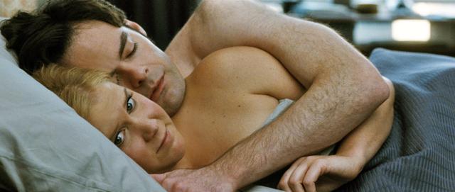 In this image released by Universal Pictures shows Amy Schumer, foreground, and Bill Hader in a scene from the comedy, Trainwreck. Schumer was nominated for a Golden Globe award for best actress in a motion picture musical or comedy for her role in the film. (AP) In this image released by Universal Pictures shows Amy Schumer, foreground, and Bill Hader in a scene from the comedy, Trainwreck. Schumer was nominated for a Golden Globe award for best actress in a motion picture musical or comedy for her role in the film. (AP)
