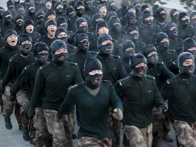 New recruit People's Liberation Army (PLA) soldiers stand in formation during a training session in cold winter temperatures at a military base in Heihe, Heilongjiang province, China, November 29, 2015.\ (REUTERS) New recruit People's Liberation Army (PLA) soldiers stand in formation during a training session in cold winter temperatures at a military base in Heihe, Heilongjiang province, China, November 29, 2015.\ (REUTERS)