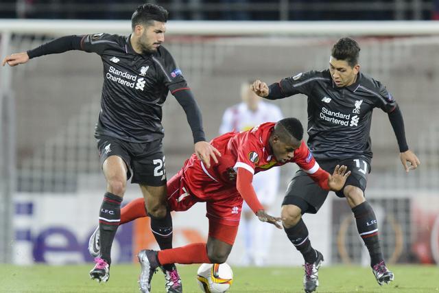 Liverpool's Emre Can and Roberto Firmino challenge for the ball with Sion's Edimilson Fernandes during the Europa League group B match between FC Sion and FC Liverpool at the Tourbillon stadium in Sion on December 10, 2015. (AP Photo) Liverpool's Emre Can and Roberto Firmino challenge for the ball with Sion's Edimilson Fernandes during the Europa League group B match between FC Sion and FC Liverpool at the Tourbillon stadium in Sion on December 10, 2015. (AP Photo)