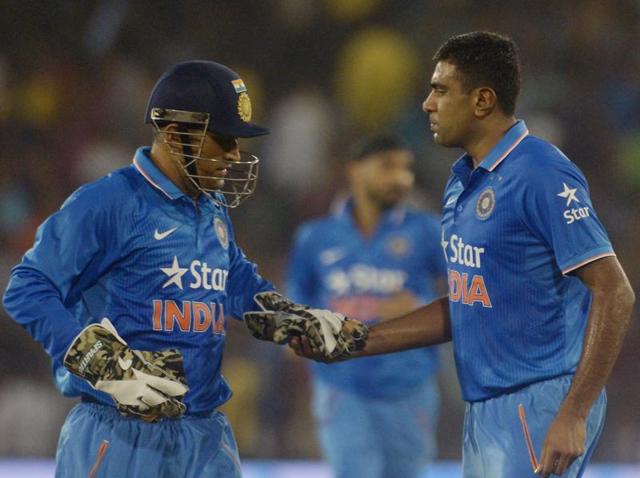 India's captain Mahendra Singh Dhoni congratulates Ravichandran Ashwin for taking a wicket during the second T20 cricket match between India and South Africa at The Barabati Stadium in Cuttack on October 5, 2015. (AFP) India's captain Mahendra Singh Dhoni congratulates Ravichandran Ashwin for taking a wicket during the second T20 cricket match between India and South Africa at The Barabati Stadium in Cuttack on October 5, 2015. (AFP)