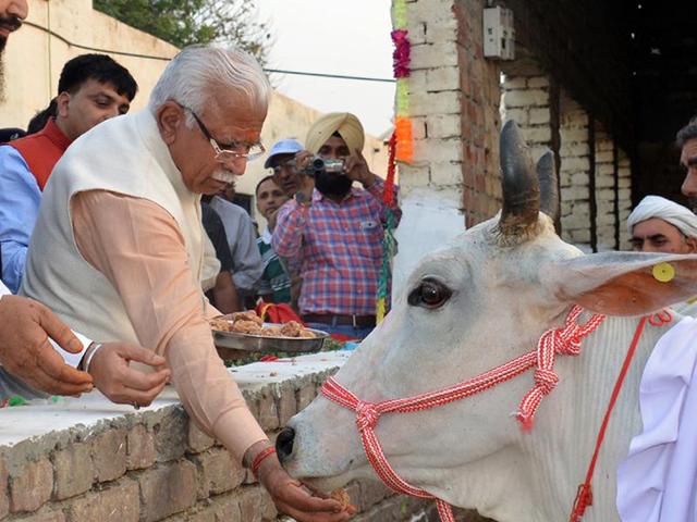 Haryana chief minister Manohar Lal Khattar had recently assured ‘gau rakshaks’ of revoking cases registered against them in the state; (right) logo of a cow-protection group. (HT FILE PHOTO) Haryana chief minister Manohar Lal Khattar had recently assured ‘gau rakshaks’ of revoking cases registered against them in the state; (right) logo of a cow-protection group. (HT FILE PHOTO)
