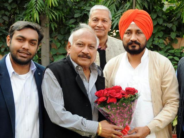 MLA Braham Mohindra congratulates newly appointed CLP leader Charanjit Channi in Patiala on Saturday. (Bharat Bhushan/HT Photo) MLA Braham Mohindra congratulates newly appointed CLP leader Charanjit Channi in Patiala on Saturday. (Bharat Bhushan/HT Photo)