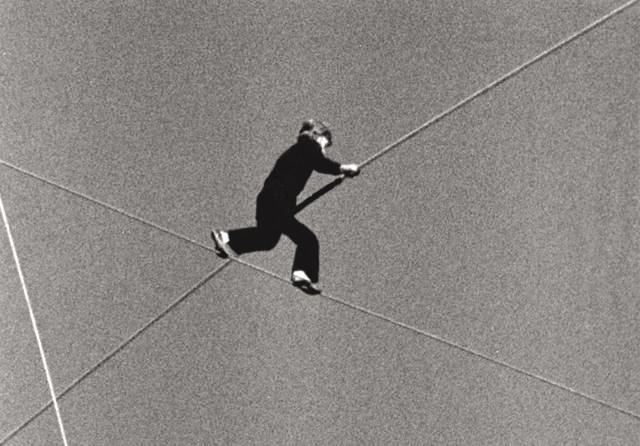 Know the ropes: Let the Great World Spin, one of the best post 9/11 novels, reaches back to Philippe Petit’s famous walk of 1974 (above) on a rope between the twin towers, as an entry into the world of human courage. (Photo: The New York Times) (NYT) Know the ropes: Let the Great World Spin, one of the best post 9/11 novels, reaches back to Philippe Petit’s famous walk of 1974 (above) on a rope between the twin towers, as an entry into the world of human courage. (Photo: The New York Times) (NYT)