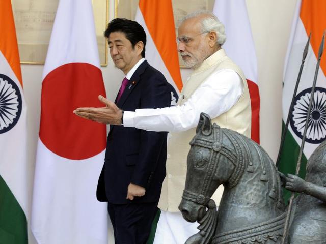 PM Narendra Modi escorts his counterpart from Japan Shinzo Abe as they arrive for their delegation level meeting at Hyderabad House in New Delhi on Saturday. Abe’s visit marked a major step in transforming India into an economic powerhouse with Japan's help in building bullet trains, smart cities and nuclear technology exchange. (Sonu Mehta/HT Photo) PM Narendra Modi escorts his counterpart from Japan Shinzo Abe as they arrive for their delegation level meeting at Hyderabad House in New Delhi on Saturday. Abe’s visit marked a major step in transforming India into an economic powerhouse with Japan's help in building bullet trains, smart cities and nuclear technology exchange. (Sonu Mehta/HT Photo)