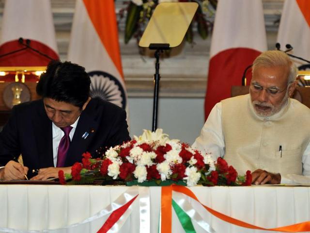 India and Japan on Saturday inked a number of pacts in key areas of defence and nuclear energy as well as building of first bullet train network between Mumbai-Ahmedabad at a cost of about Rs 98,000 crore. (Sonu Mehta/HT Photo) India and Japan on Saturday inked a number of pacts in key areas of defence and nuclear energy as well as building of first bullet train network between Mumbai-Ahmedabad at a cost of about Rs 98,000 crore. (Sonu Mehta/HT Photo)