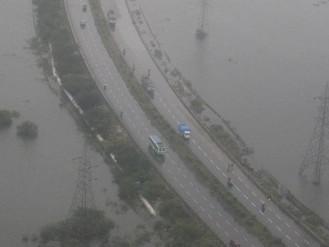 National Disaster Response Force personnel rescue people stranded in floodwaters in Chennai, in the southern Indian state of Tamil Nadu on Dec. 04, 2015. The relentless rains that lashed southern India's Tamil Nadu state have eased on Friday, but the misery of tens of thousands of people was far from over.(AP) National Disaster Response Force personnel rescue people stranded in floodwaters in Chennai, in the southern Indian state of Tamil Nadu on Dec. 04, 2015. The relentless rains that lashed southern India's Tamil Nadu state have eased on Friday, but the misery of tens of thousands of people was far from over.(AP)