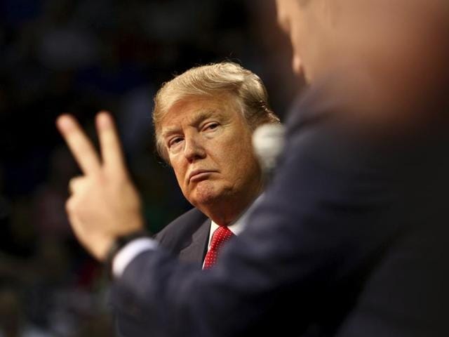 Republican presidential candidate Donald Trump waves at the crowd during a town hall style campaign rally at the Varied Industries Building, Iowa State Fair Grounds in Des Moines, Iowa on Friday. Recent polls continue to show Trump holding a lead in the race for the Republican nomination for President. (AFP) Republican presidential candidate Donald Trump waves at the crowd during a town hall style campaign rally at the Varied Industries Building, Iowa State Fair Grounds in Des Moines, Iowa on Friday. Recent polls continue to show Trump holding a lead in the race for the Republican nomination for President. (AFP)