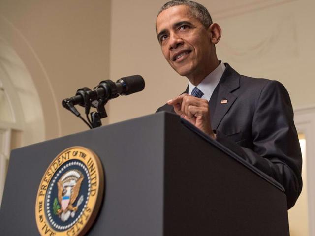 US President Barack Obama delivers a statement in the Cabinet Room at the White House in Washington DC on Saturday after an international climate accord was reached in Paris. Obama hailed as historic the climate agreement calling it "a turning point for the world".(AFP)