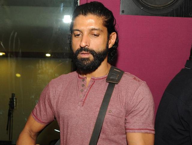 Farhan Akhtar performs during a song recording session for the upcoming Hindi film Wazir directed by Vidu Vinod Chopra in Mumbai. (AFP)