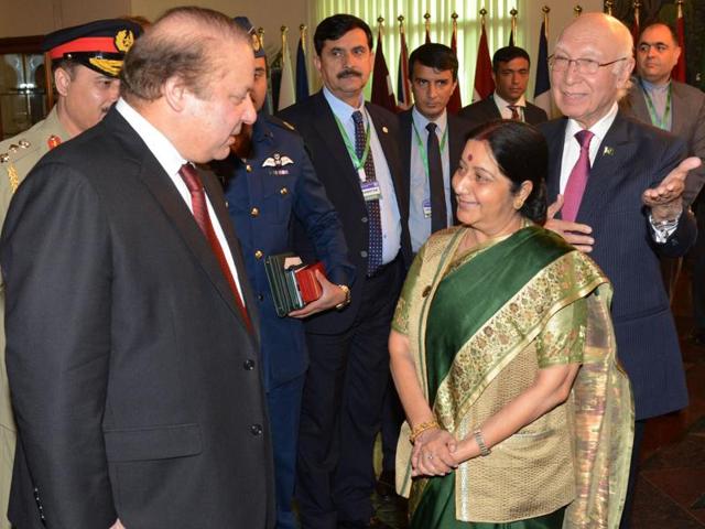 External Affairs Minister Sushma Swaraj with Pakistan Prime Minister Nawaz Sharif during a meeting in Islamabad on Wednesday. (PTI Photo) External Affairs Minister Sushma Swaraj with Pakistan Prime Minister Nawaz Sharif during a meeting in Islamabad on Wednesday. (PTI Photo)