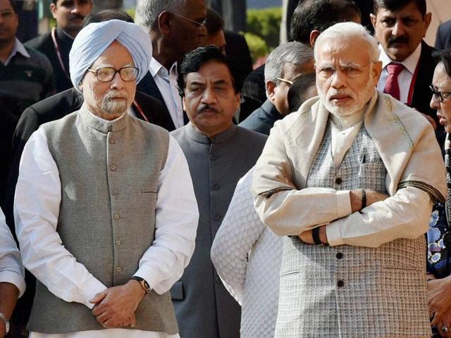 Prime Minister Narendra Modi with former PM Manmohan Singh while paying tribute to the martyrs of 2001 Parliament attack on its 14th anniversary at Parliament House in New Delhi on Sunday. The government’s plan to call the Congress for a meeting comes after the Opposition party’s charge that the Centre had not responded to three of its key demands on the long-pending bill. (PTI) Prime Minister Narendra Modi with former PM Manmohan Singh while paying tribute to the martyrs of 2001 Parliament attack on its 14th anniversary at Parliament House in New Delhi on Sunday. The government’s plan to call the Congress for a meeting comes after the Opposition party’s charge that the Centre had not responded to three of its key demands on the long-pending bill. (PTI)