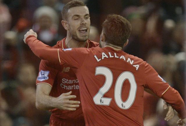 Liverpool's English midfielder Jordan Henderson celebrates with Liverpool's English midfielder Adam Lallana after scoring the opening goal during the English Premier League football match between Liverpool and West Bromwich Albion at Anfield on December 13, 2015. (AFP Photo) Liverpool's English midfielder Jordan Henderson celebrates with Liverpool's English midfielder Adam Lallana after scoring the opening goal during the English Premier League football match between Liverpool and West Bromwich Albion at Anfield on December 13, 2015. (AFP Photo)