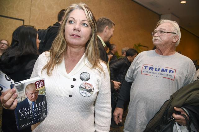 Supporter Dee McNamara waits in line to attends Republican presidential hopeful Donald Trump's rally, December 14, 2015 at the Westgate Hotel & Resort in Las Vegas, Nevada. (AFP) Supporter Dee McNamara waits in line to attends Republican presidential hopeful Donald Trump's rally, December 14, 2015 at the Westgate Hotel & Resort in Las Vegas, Nevada. (AFP)