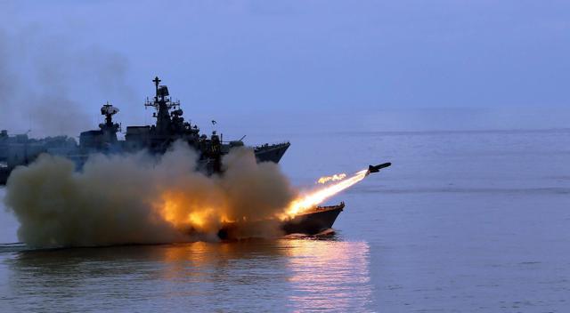 A Surface to Surface Missile (SSM) is fired by INS Nirghat (a missile boat). (PTI) A Surface to Surface Missile (SSM) is fired by INS Nirghat (a missile boat). (PTI)