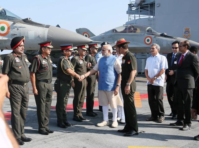 Prime Minister Narendra Modi with Union Minister for Defence, Manohar Parrikar and Army Chief Dalbir Singh Suhag (PTI) Prime Minister Narendra Modi with Union Minister for Defence, Manohar Parrikar and Army Chief Dalbir Singh Suhag (PTI)