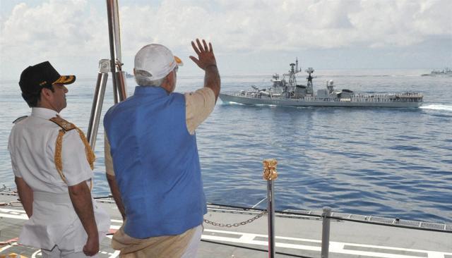 Kochi: Prime Minister Narendra Modi waves at a ship from INS Vikramaditya, in Kochi. (PTI) Kochi: Prime Minister Narendra Modi waves at a ship from INS Vikramaditya, in Kochi. (PTI)