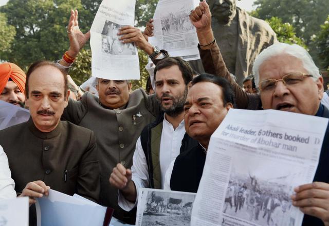 Rahul Gandhi with party MPs staging a protest near the Parliament on Monday over law and order situation in Punjab. (PTI) Rahul Gandhi with party MPs staging a protest near the Parliament on Monday over law and order situation in Punjab. (PTI)