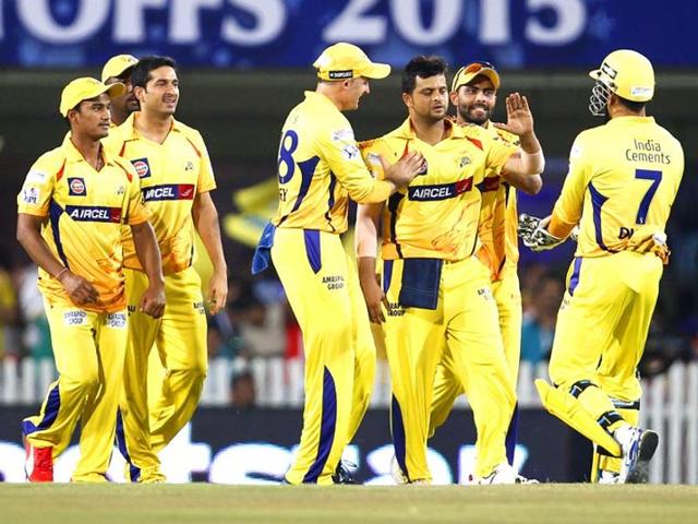 Suresh Raina celebrates with teammates after taking the wicket of Royal Challengers Bangalore's Chris Gayle during their Indian Premier League (IPL) 2015 Qualifier 2 match in Ranchi on May 22.(HT Photo)