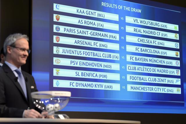 UEFA Competitions Director Giorgio Marchetti looks at the match fixtures on an electronic panel following the draw of the 2015/16 Champions League Round of 16 at the UEFA Headquarters. (AP)