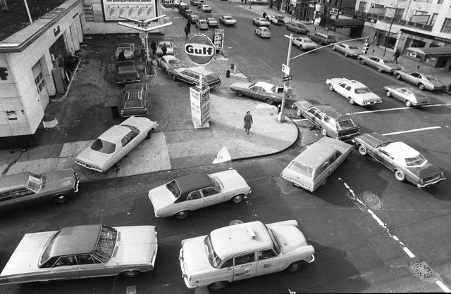 Cars line up in two directions at a gas station in New York City. (AP) Cars line up in two directions at a gas station in New York City. (AP)