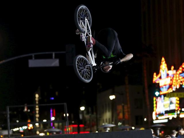 A stunt cyclist performs a trick at the premiere of the Point Break remake in Hollywood, California. (REUTERS) A stunt cyclist performs a trick at the premiere of the Point Break remake in Hollywood, California. (REUTERS)