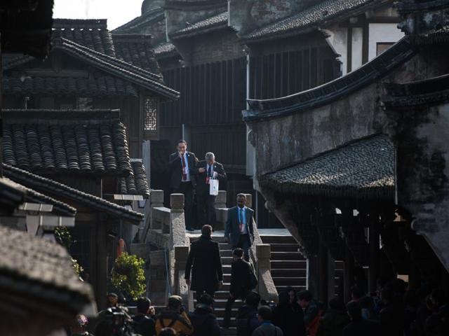 The ‘Bridge within a Bridge’ is a popular scenic attraction involving Tongji and Renji bridges in the town. Participants cross a bridge to enter the World Internet Conference venue in Wuzhen on December 16, 2015. (AFP) The ‘Bridge within a Bridge’ is a popular scenic attraction involving Tongji and Renji bridges in the town. Participants cross a bridge to enter the World Internet Conference venue in Wuzhen on December 16, 2015. (AFP)