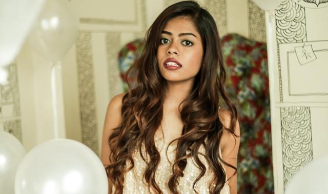 Tong your hair into anything from tight curls to bigger, softer curls and leave it open if you’re going clubbing (Photo: Streak Hue Fall — The Salon)