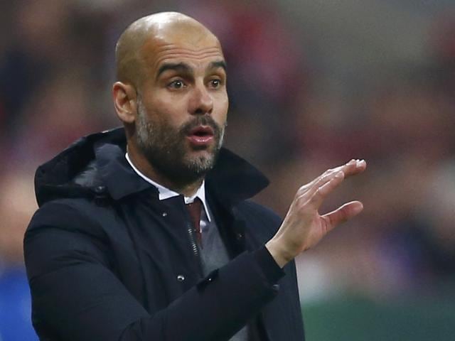 Bayern Munich's coach Pep Guardiola during the match against Borrusia Monchengladbach. (Reuters Photo)