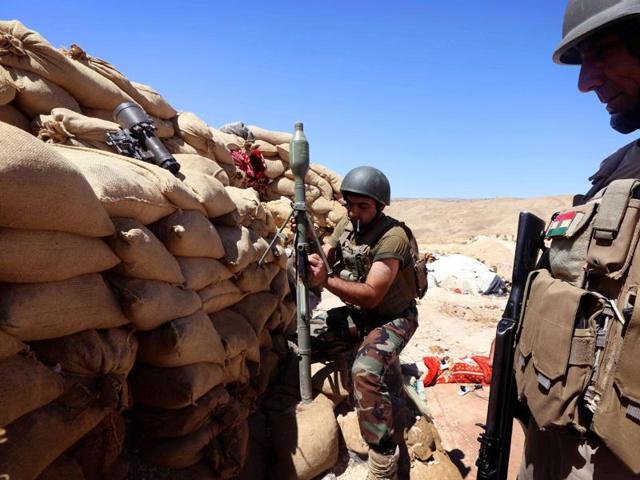 Two Iraqi volunteers were killed when Islamic State jihadists attacked Bashiqa camp on Wednesday. (AFP) Two Iraqi volunteers were killed when Islamic State jihadists attacked Bashiqa camp on Wednesday. (AFP)