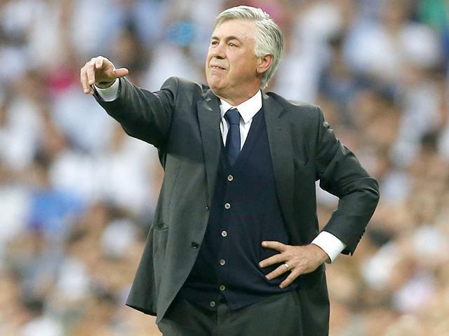 Carlo Ancelotti giving directions to his players during the Champions League second leg semi final match between Real Madrid and Juventus at the Santiago Bernabeu stadium. (AP Photo)