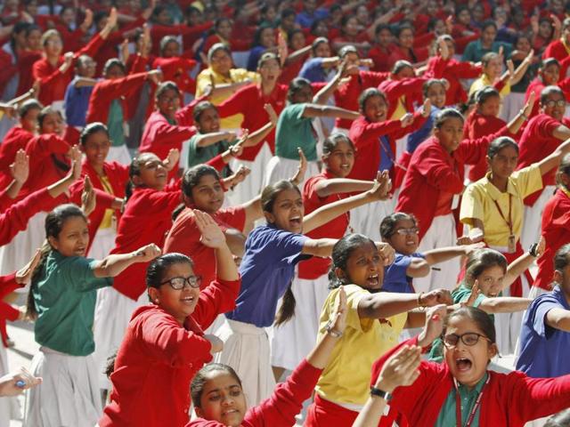Schoolgirls practice martial arts during an event in Ahmedabad to mark the third anniversary of the fatal gang rape. (Reuters Photo)