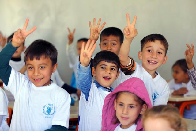 Syrian Refugee children attend classes at the refugee camp in Osmaniye. In September, the Turkish government promised to double the number of Syrian refugees at school, from the current 230,000. (AFP)