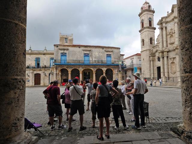 Old Havana (Havana Vieja) was founded by the Spanish in 1519 in the natural harbour of the Bay of Havana. Tourists visit the Old Havana, on December 16, 2015. (AFP)