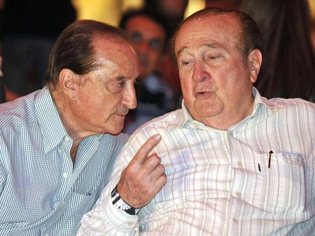A file photo of South American Football Confederation vice-president Eugenio Figueredo and president Nicolas Leoz chat during the presentation of the new Paraguayan national football team kit for the 2011 Copa America . (AFP) A file photo of South American Football Confederation vice-president Eugenio Figueredo and president Nicolas Leoz chat during the presentation of the new Paraguayan national football team kit for the 2011 Copa America . (AFP)
