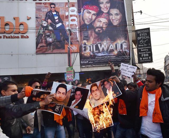 Hindu Sena activists burn posters of actors Aamir Khan and Shah Rukh Khan after the release of SRK's Dilwale in Lucknow on Friday. (PTI) Hindu Sena activists burn posters of actors Aamir Khan and Shah Rukh Khan after the release of SRK's Dilwale in Lucknow on Friday. (PTI)